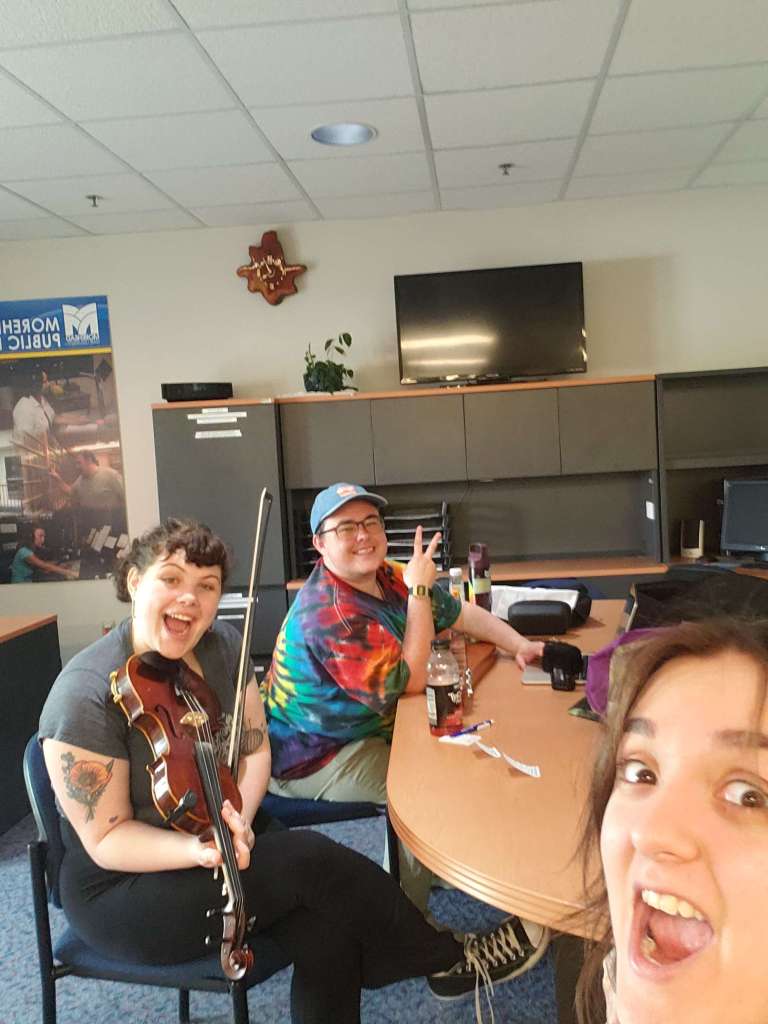 Violet, Clay, and Anabel hanging out at Morehead State Public Radio.
